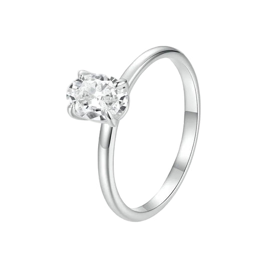 Silver ring with a clear gemstone on a white background