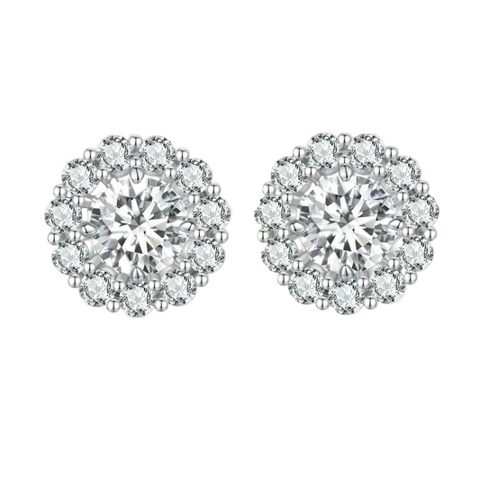 Pair of diamond earrings on a white background