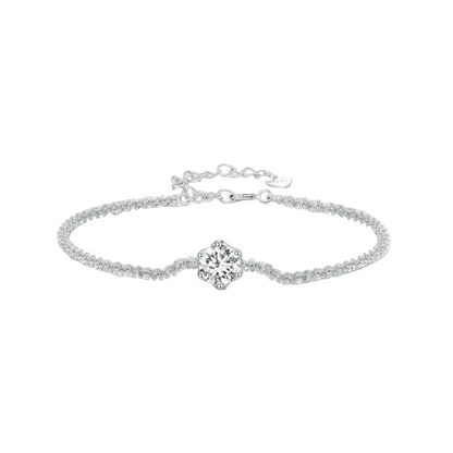 Silver bracelet with a diamond on a white background