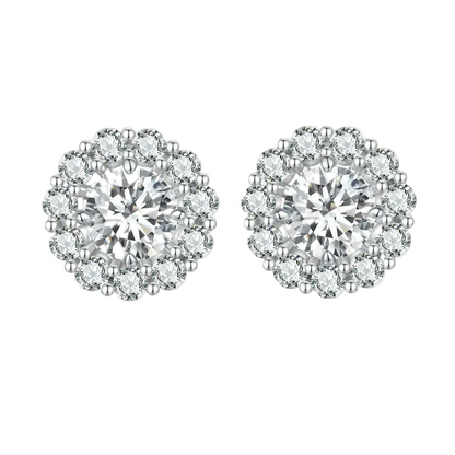 Pair of diamond earrings on a white background